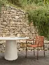 Vincent-Sheppard_Mistral-dining-table_Sweep-dining-chair-cinnamon-rust_2_HR.webp
