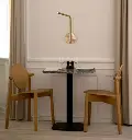 UMAGE_lifestyle_Omni-Pivot_brass_Heiko_oak_Gather_café-table_emperador_(1).webp