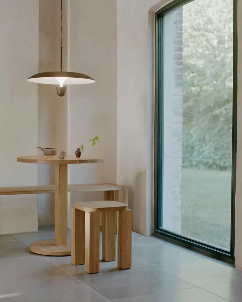 New-Works_Lifestyle_22120_Kantarell-Pendant-Lamp_Ø55_Black_42760_Atlas-Bistro-Table_Natural-Oak_42740_Atlas-Bench_100x32_Natural-Oak.webp