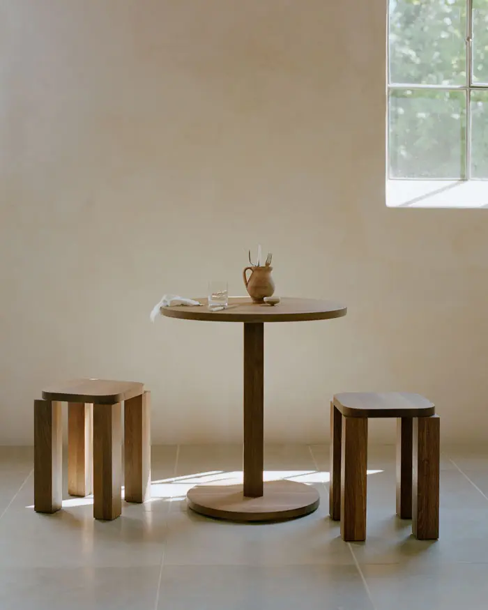 New-Works_Lifestyle_42761_Atlas-Bistro-Table_Fumed-Oak_42731_Atlas-Stool_Fumed-Oak_1.webp