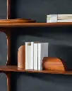 29770_PI_Bookends_mahogany_29778_PI_wall_shelf_3_shelves_mahogany_29744_Thin_oval_boards_mahogany_WEB.webp