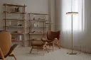 UMAGE_lifestyle_A-Conversation-Piece_low_ottoman_oak_cognac_(3).webp