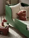 fermLIVING_SS24_SillJuniorBed_VerdantGreen_1104268751_SwifBirdCushion_BakedClay_1104268639_ArumPortableLamp_OxideRed_1104269286_1.webp