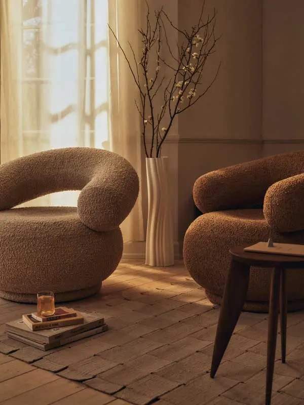 FermLiving_SS26_OrboLoungeChairRawBouclé_1104273182_1104273522_1104273747_1104273353_1104273745_1104273746_FoundationRug_1104273171.webp